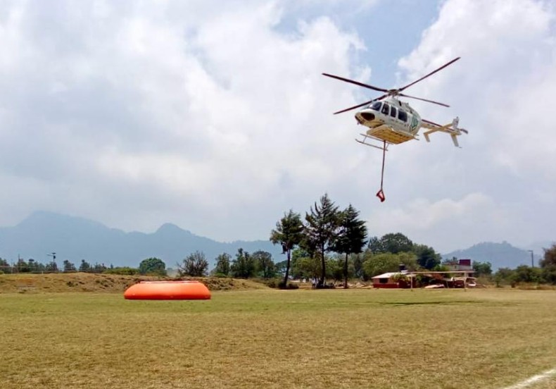 Supervisan desde el aire incendio forestal en Jilotzingo, Zacatlán