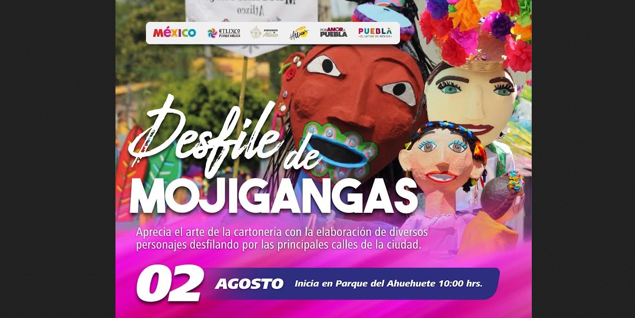 Mojigangas recorren las calles de Atlixco durante un desfile tradicional.