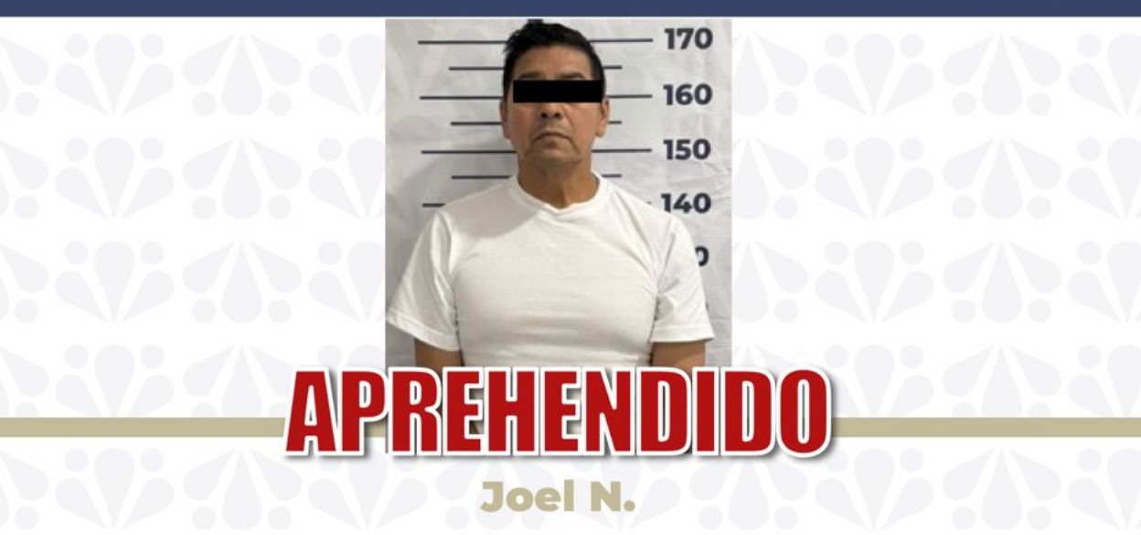 Agentes de la FGE Puebla durante una detención.
