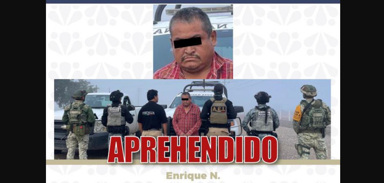 Agentes investigadores durante el cumplimiento de una orden de aprehensión.