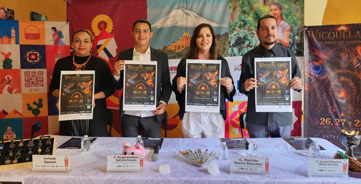 Evento cultural en el Cuexcomate con actividades y asistentes en Puebla.