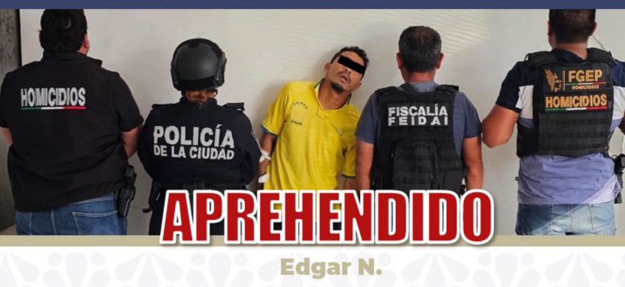 Elementos de la Fiscalía de Puebla durante una detención.
