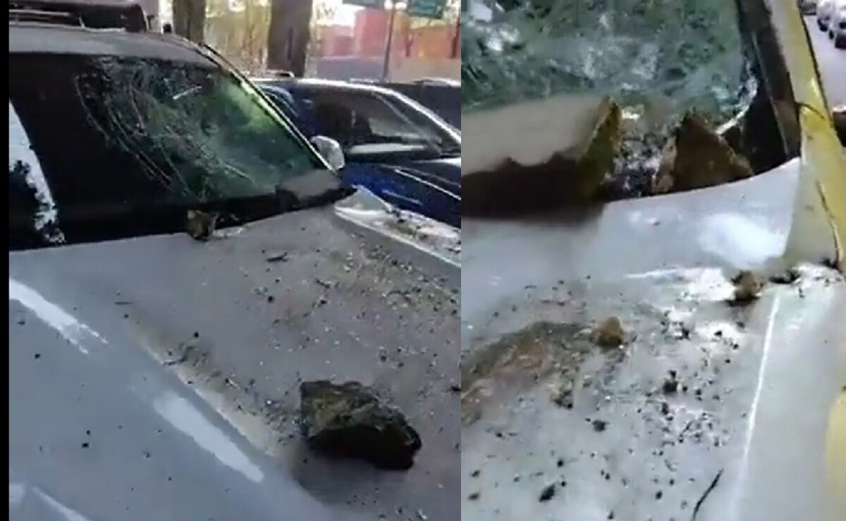 Cae parte de concreto del segundo piso del periférico sobre camioneta