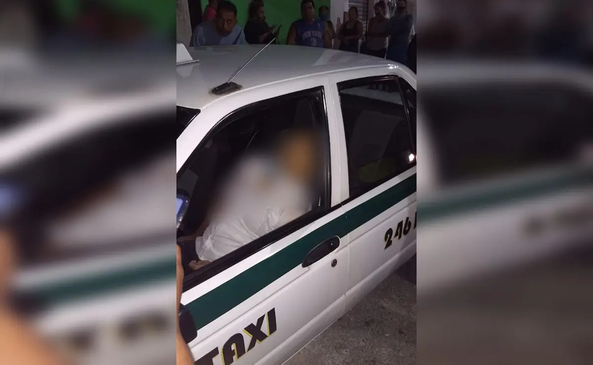 Taxista muere al impactarle una bala perdida de asaltantes
