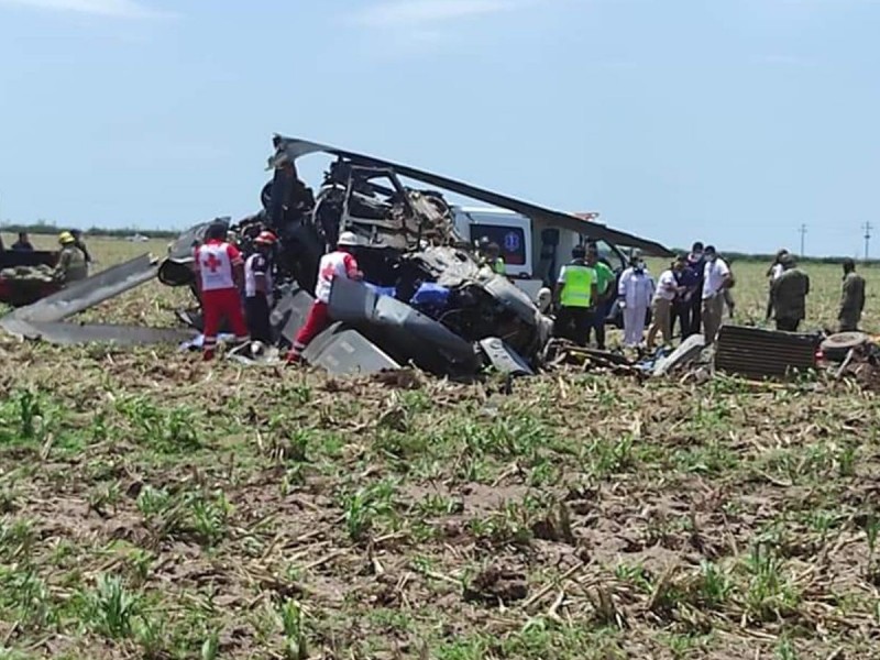 Trasladan cuerpos de marinos fallecidos tras desplome de helicóptero durante captura de Caro Quintero