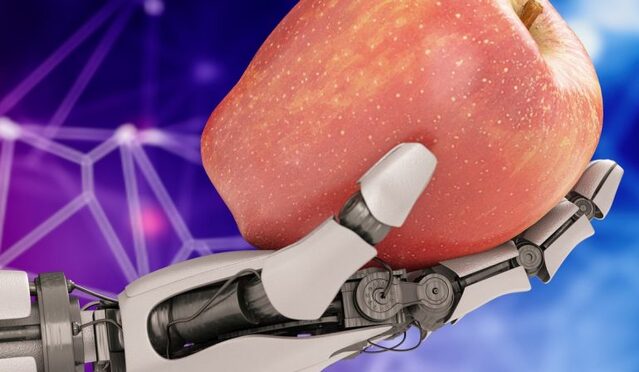 Hombre con parálisis logra comer por sí mismo controlando brazos robóticos con su mente