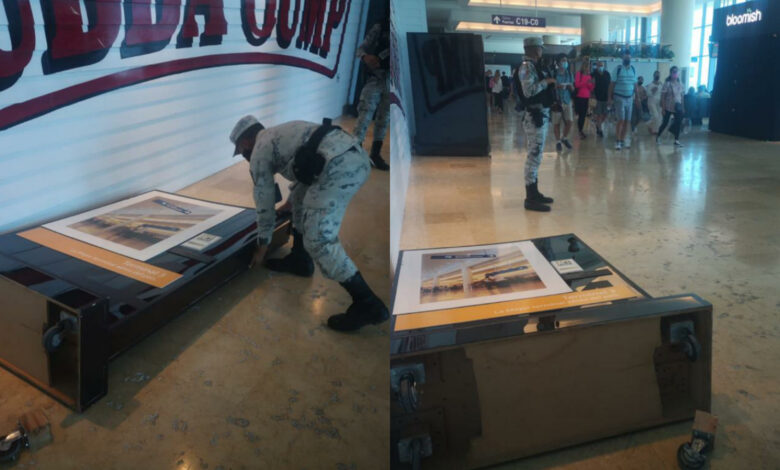 La caída de mamparas en el aeropuerto provocó el estruendo y ruidos semejantes a detonaciones en Cancún: GN