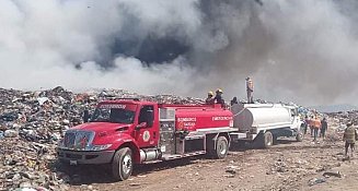Arrecia incendio en relleno sanitario de Atlangatepec; se movilizan autoridades