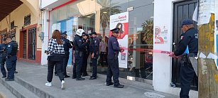 Hombre baleado durante asalto en sucursal de HSBC en Calpulalpan