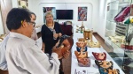 Foto: Cortesía Artesanos de Tlaxcala participan con piezas de madera tallada.