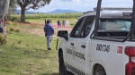Foto: Cortesía Policías resguardan zona donde fue localizado un hombre sin vida en Muñoz.
