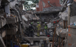 Foto: Cortesía Rescatistas retiran escombros tras el terremoto en Cali, Colombia.
