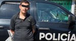 Policías resguardan una vivienda en Monterrey tras un ataque.