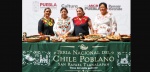 Foto: Cortesía Escenario principal de la Feria de Acajete 2026 con asistentes.