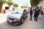 Foto: Cortesía Patrulla de seguridad vigilando vehículos estacionados en Tlaxcala.