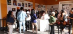 Personas participan en un taller artístico organizado por la Secretaría de Arte y Cultura de Puebla.