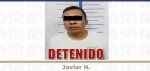 Agentes de la Fiscalía General del Estado de Puebla durante una investigación.