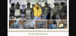 Policías durante cateo en vivienda en Puebla
