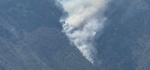 Brigadistas combatiendo incendio forestal en Zautla