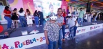 Familias disfrutando la Feria de Puebla con juegos y comida