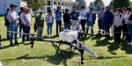 Dron Agras T70 sobre cultivo de maíz